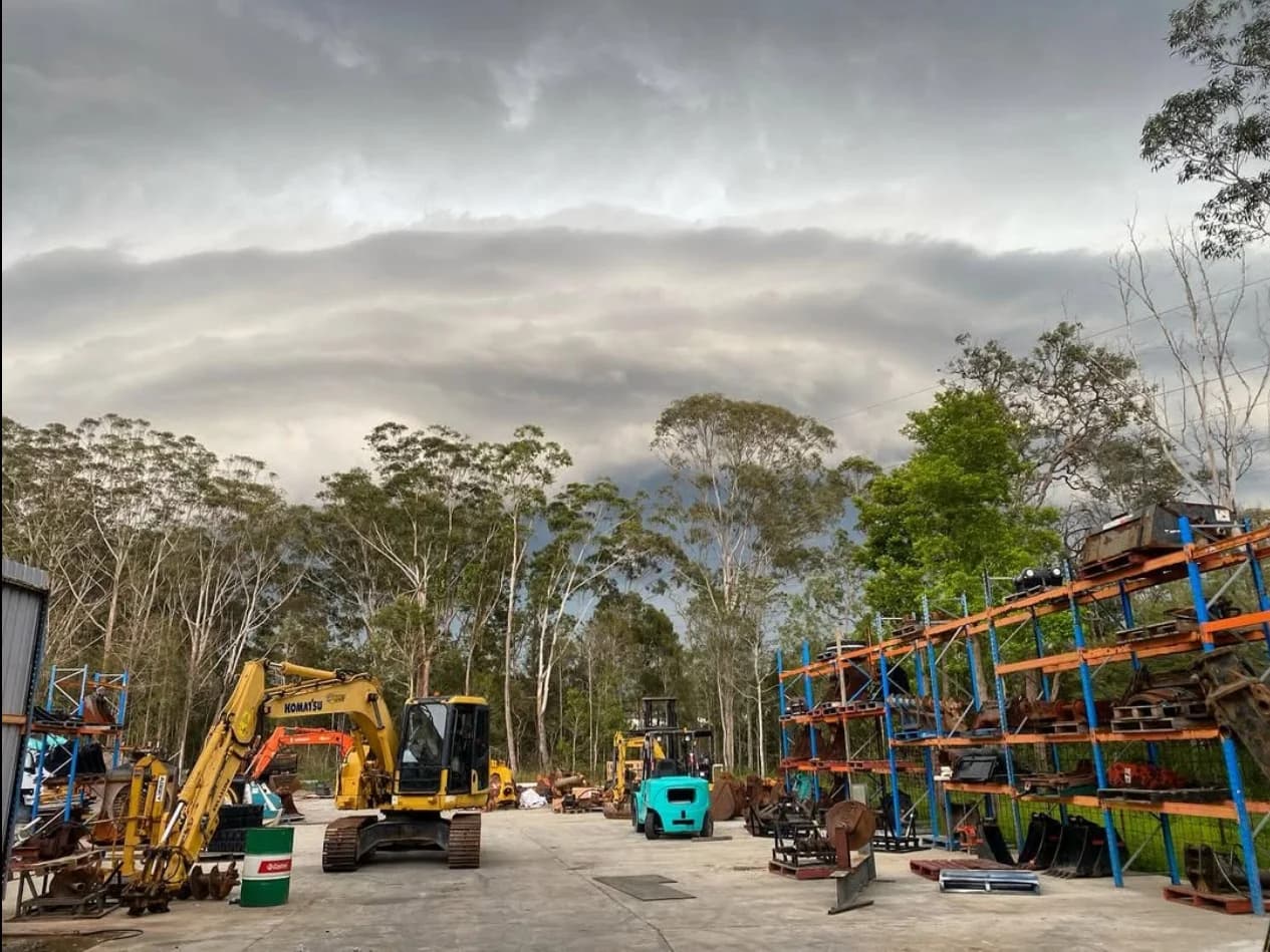 Berkeley Vale yard with buckets, machines and racking ready for pickup.