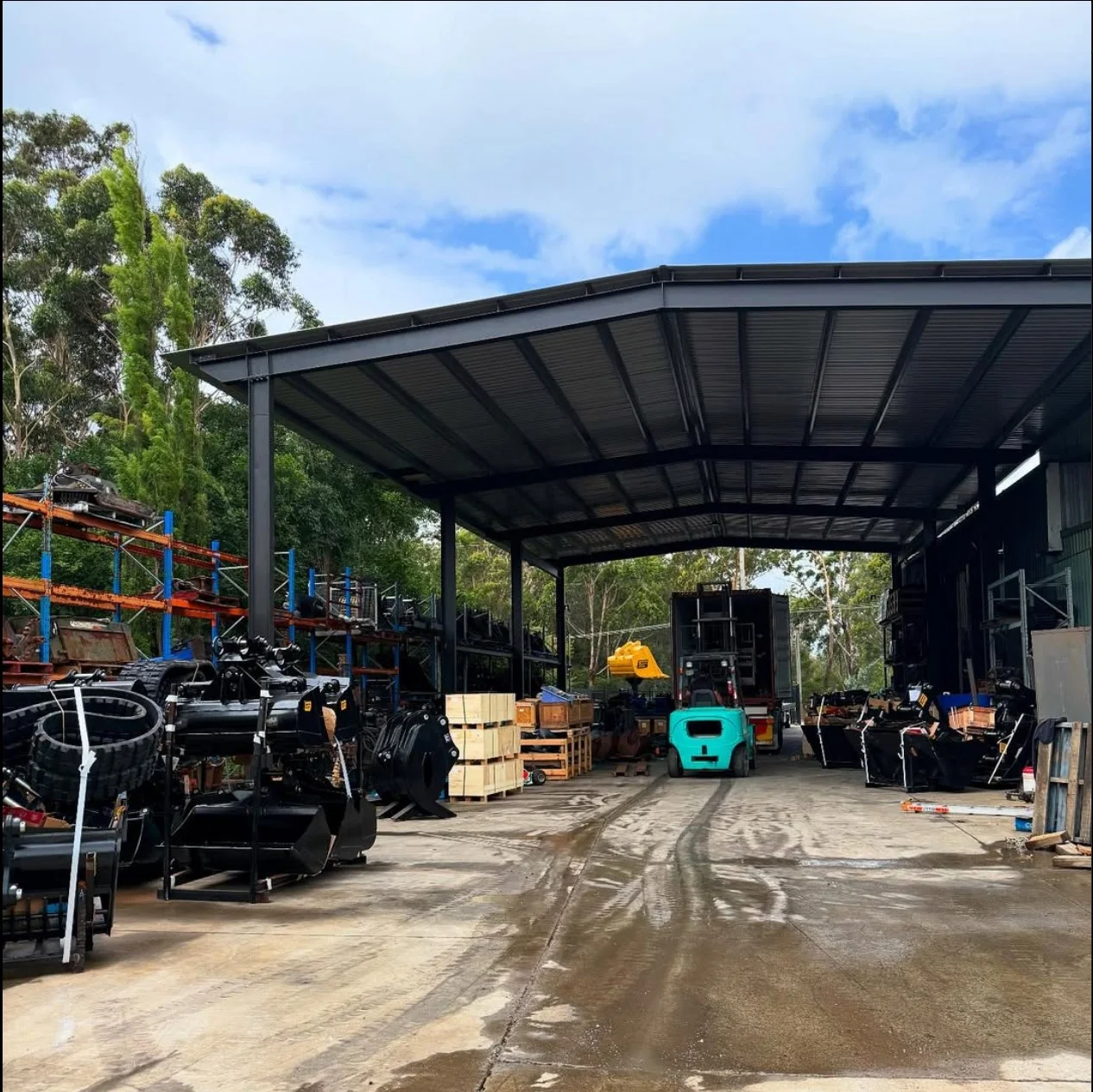 Behind the scenes at our warehouse! Our team is busy organizing and preparing attachments.